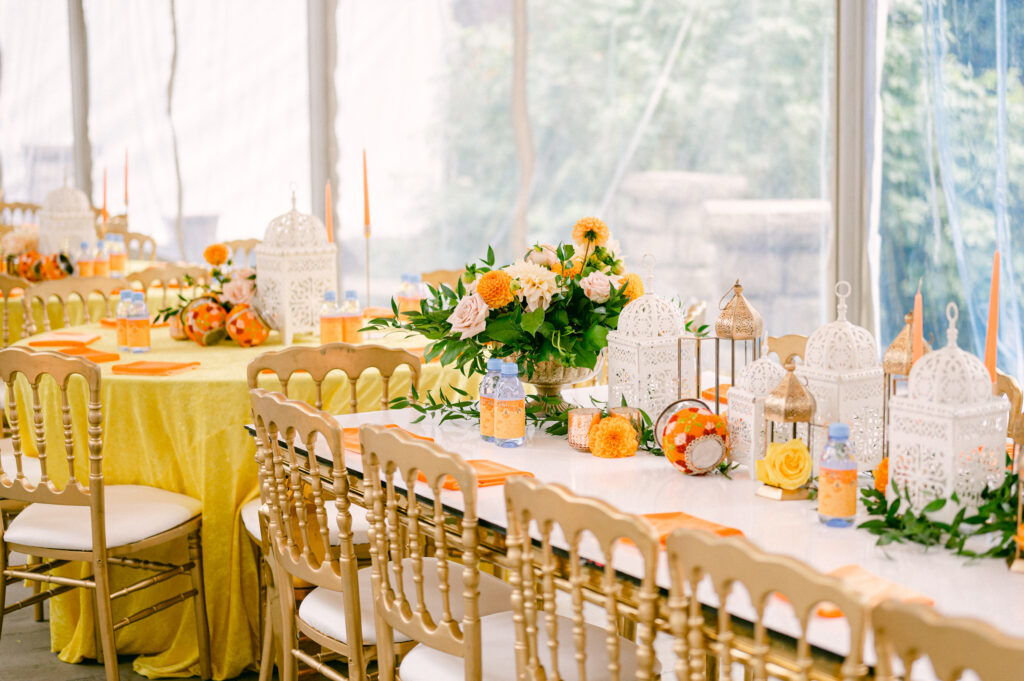 Bright table styling with florals and lanterns for a South Asian destination wedding in Dubai celebration