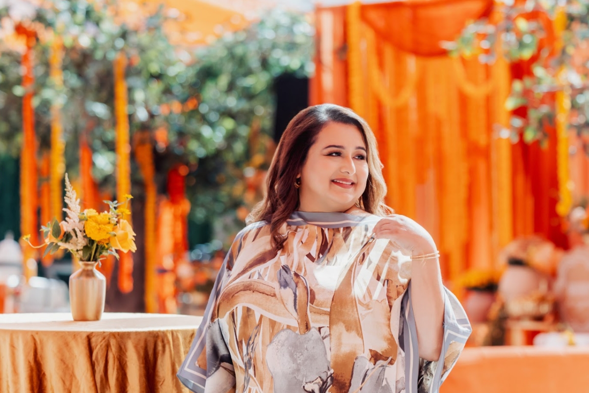 luxury wedding planner overseeing a wedding payment schedule during event setup